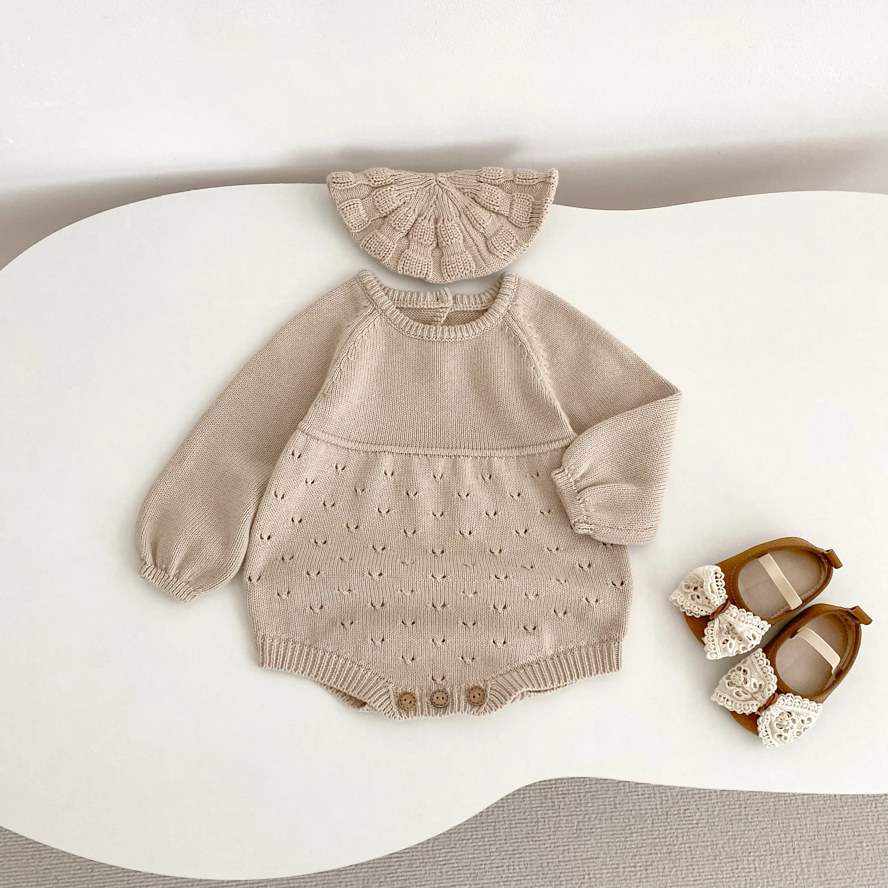 New autumn baby clothing: 0-3 year old girls' long sleeved hollow knitted jumpsuit, casual and versatile girls' jumpsuit