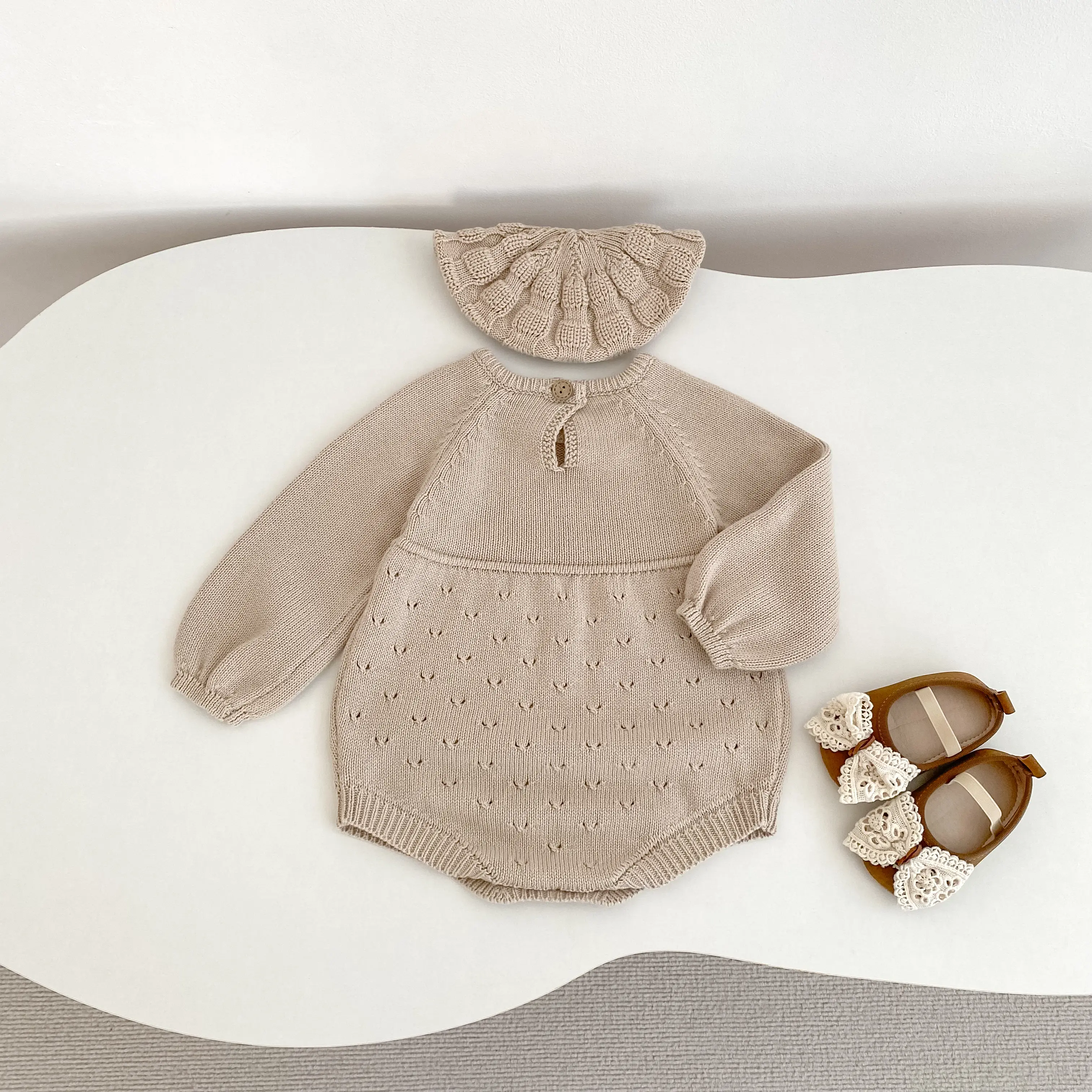 New autumn baby clothing: 0-3 year old girls' long sleeved hollow knitted jumpsuit, casual and versatile girls' jumpsuit