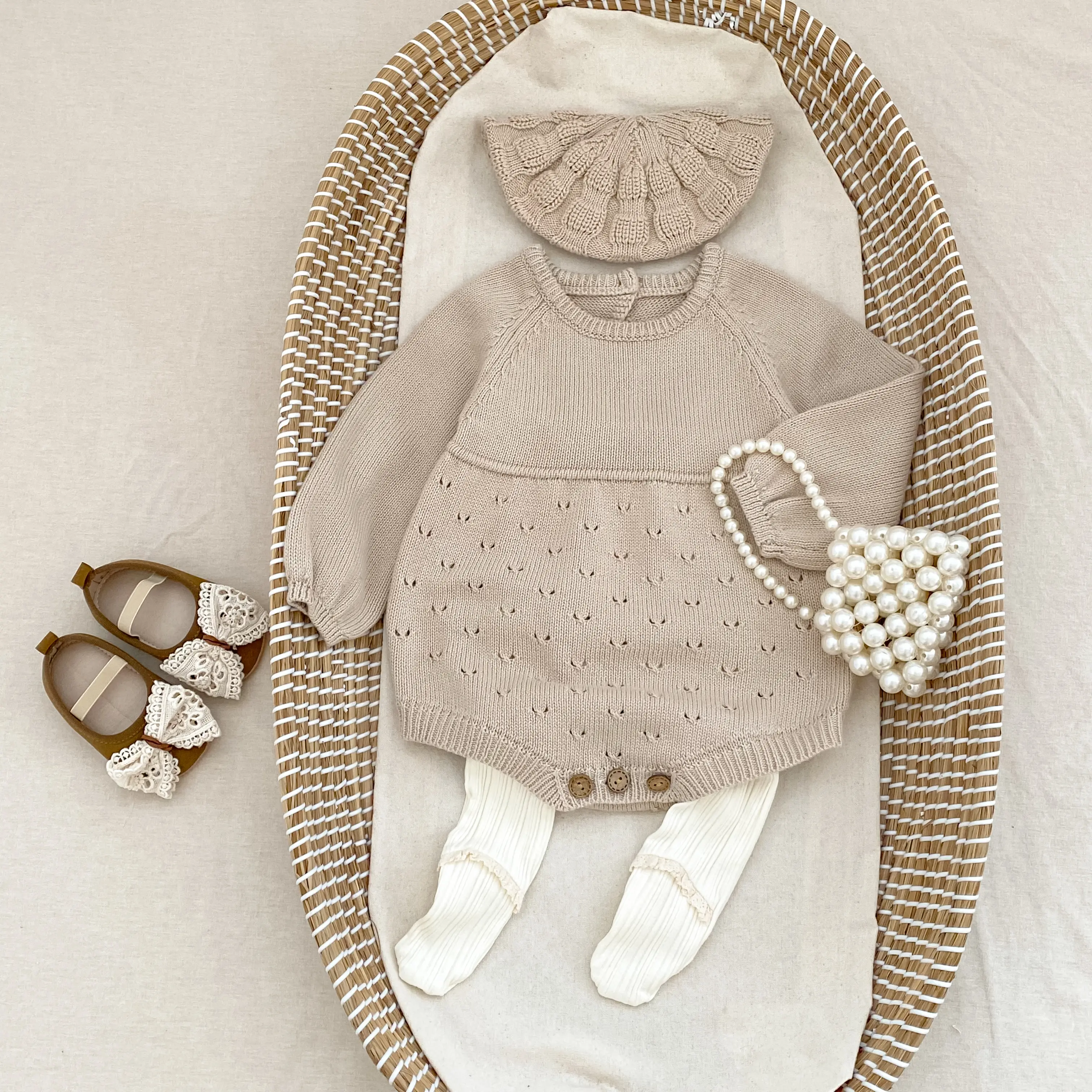 New autumn baby clothing: 0-3 year old girls' long sleeved hollow knitted jumpsuit, casual and versatile girls' jumpsuit