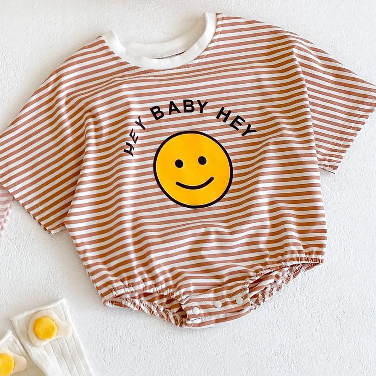 INS summer new baby and children's jumpsuit, baby girl cotton short sleeved smiling face printed striped jumpsuit, crawling jump