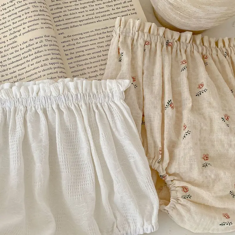 New summer baby clothing, 0-3 year old girls with floral wood ear edges wrapped in butt bread pants shorts