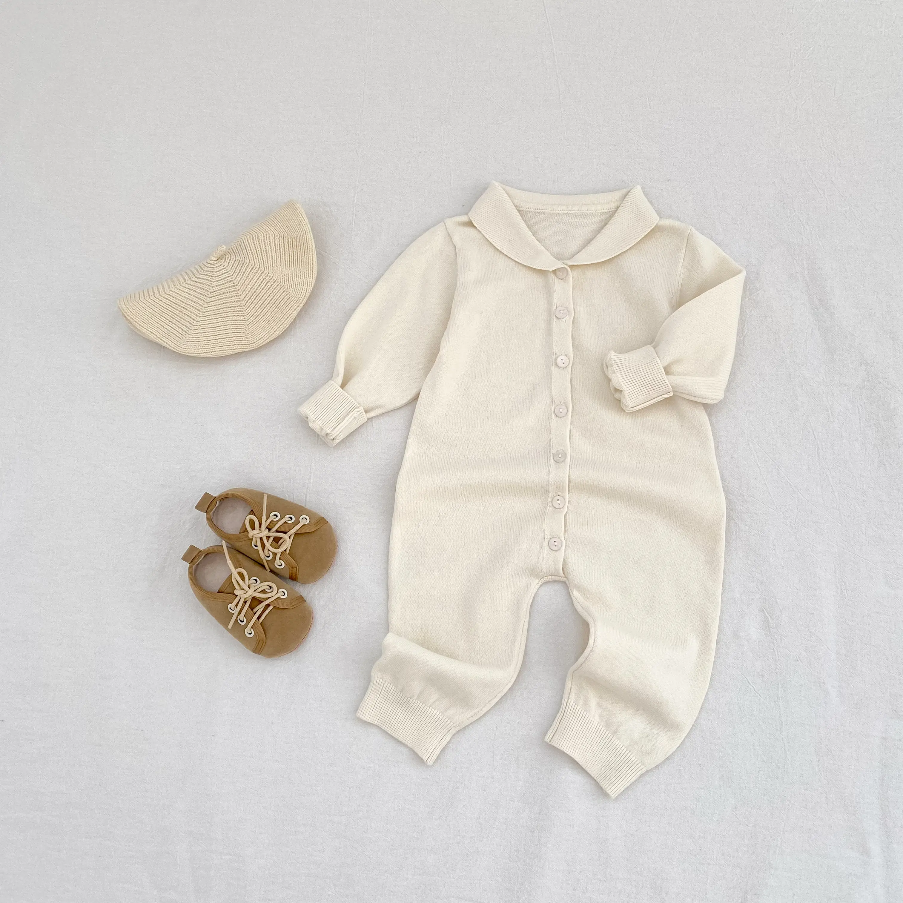 Autumn new 0-3 year old baby clothing, fashionable baby girl baby boy lapel long sleeved button jumpsuit