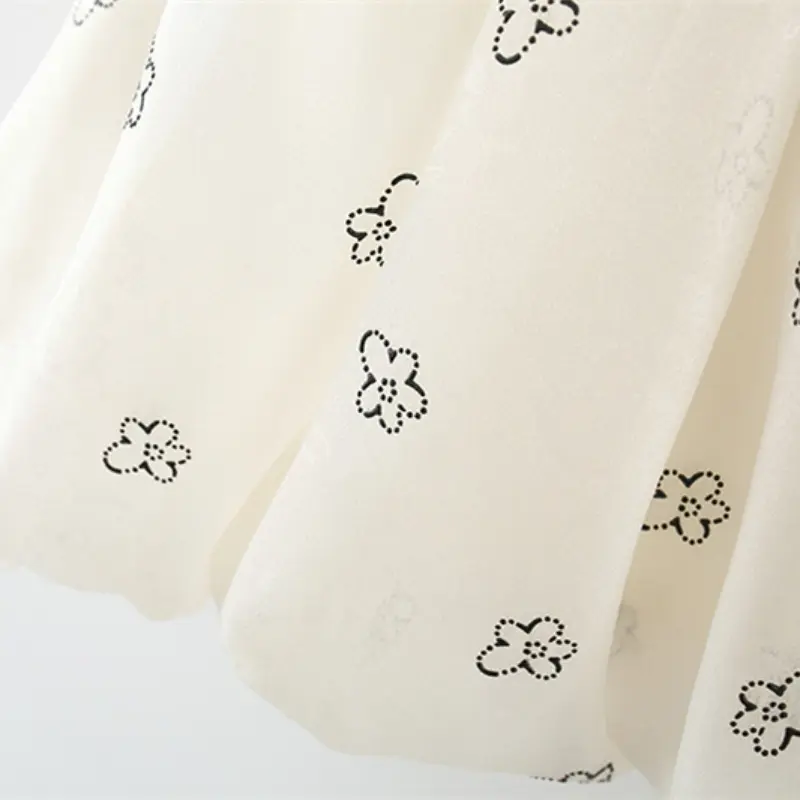 Summer baby girl dress girls covered in floral prints with a large bow on the back and a fluffy dress with suspenders