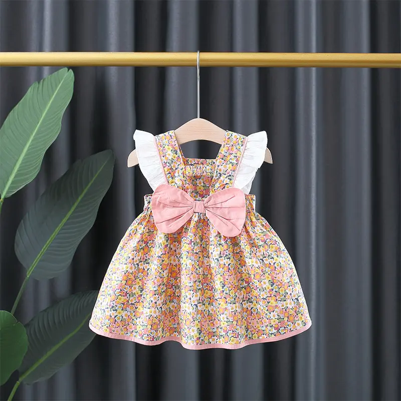 Baby Girls Floral Print Princess Dress With White Lace On The Sides And A Big Bow In The Back