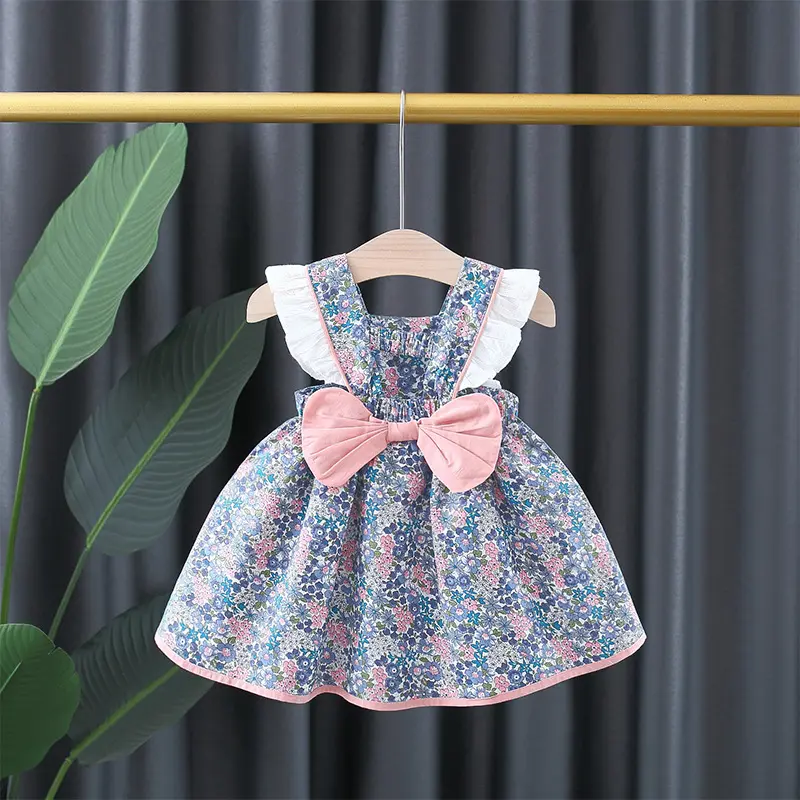 Baby Girls Floral Print Princess Dress With White Lace On The Sides And A Big Bow In The Back