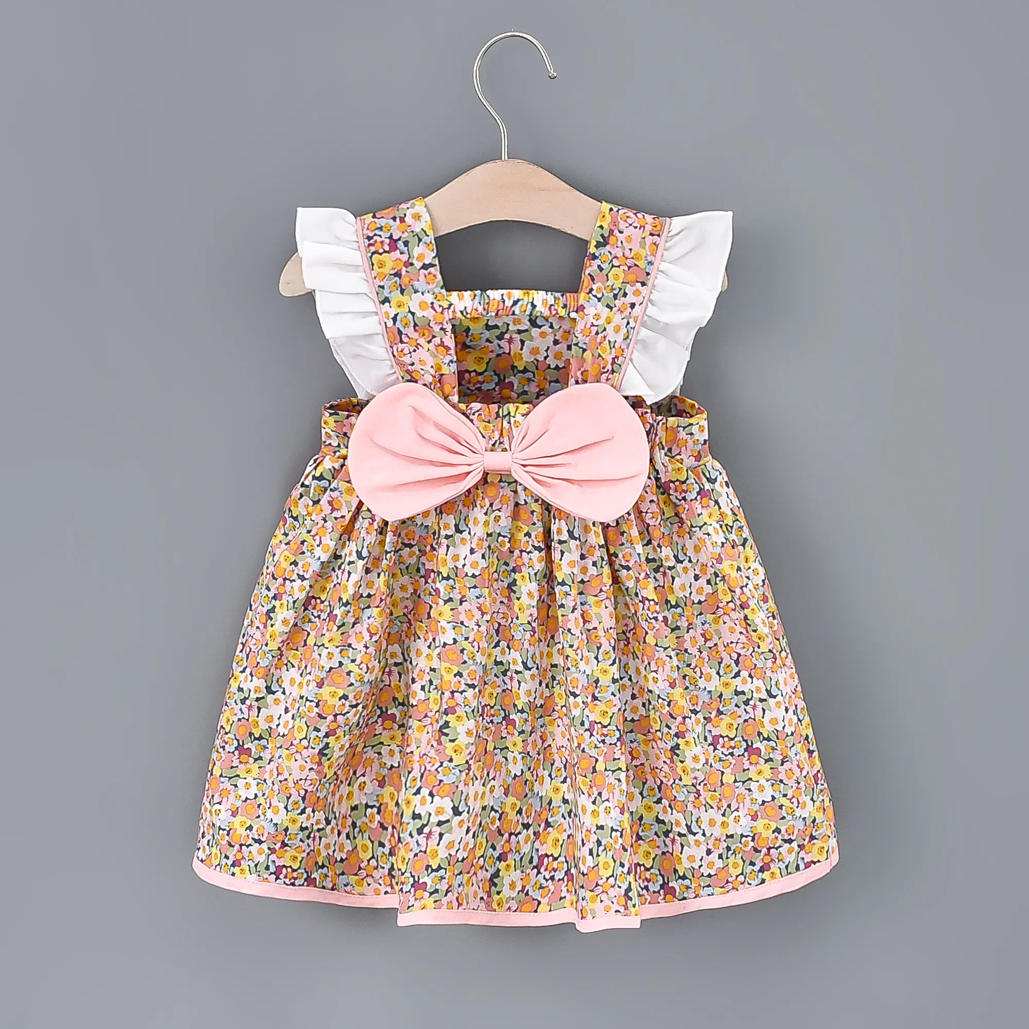 Baby Girls Floral Print Princess Dress With White Lace On The Sides And A Big Bow In The Back