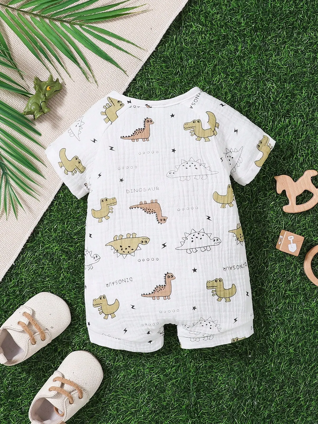 The New Summer Baby Cartoon Dinosaur Full-Print Short-Sleeved Jumpsuit Is Made Of Pure Cotton, Soft, Comfortable And Cute