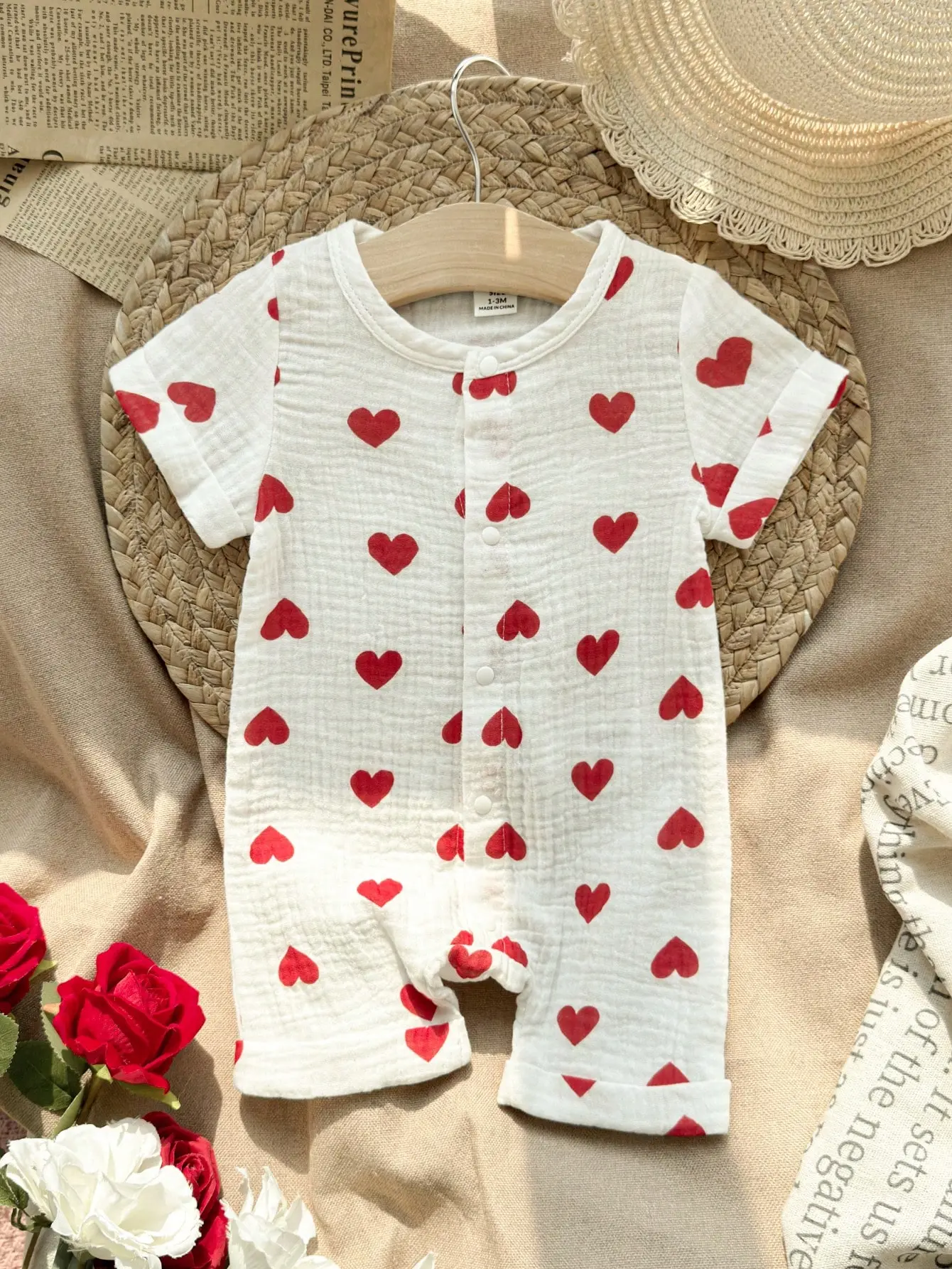 The New Pure Cotton Heart-Shaped Full-Print Short-Sleeved Jumpsuit For Newborn Babies In Summer Is Comfortable And Soft