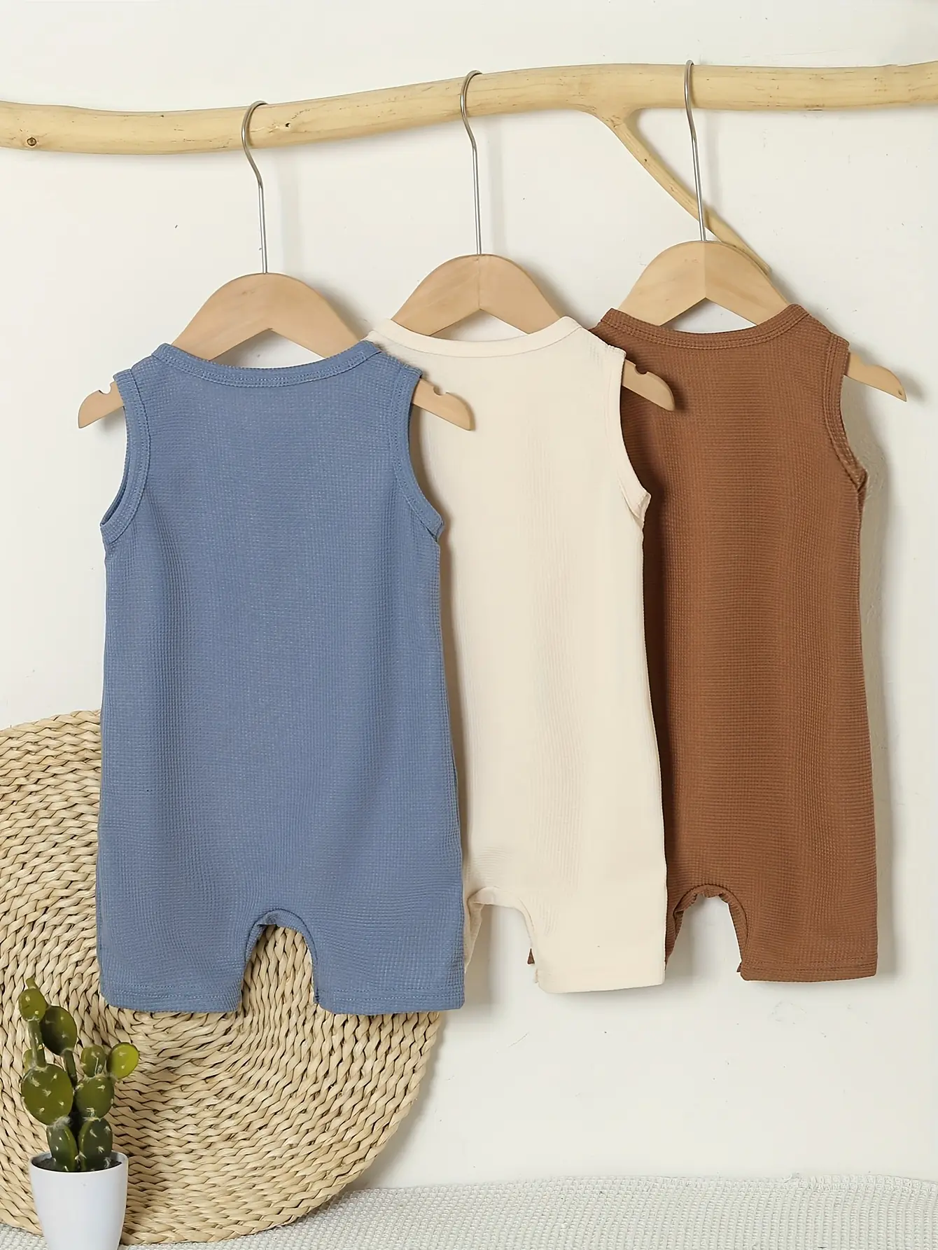 A Cute Little Bear Sticker Sleeveless Comfortable Vest Jumpsuit For A Baby Boy 3 Pieces In Summer Made Of Waffle Fabric