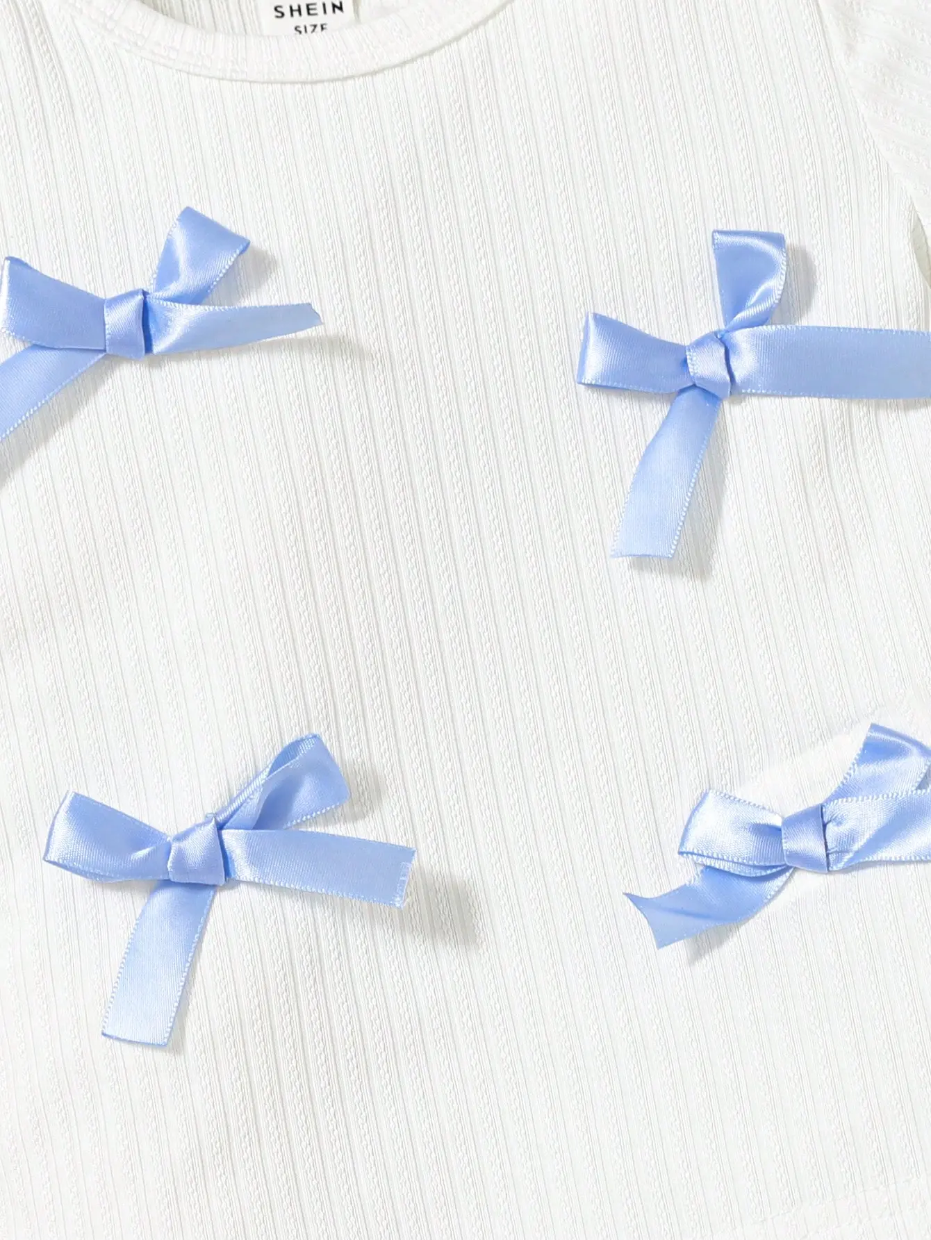 2025 Summer White Ribbed Jacquard Fabric Blue Bow Short Sleeve Blue Trouser Suit Comfortable And Soft For Outdoor Vacation Set