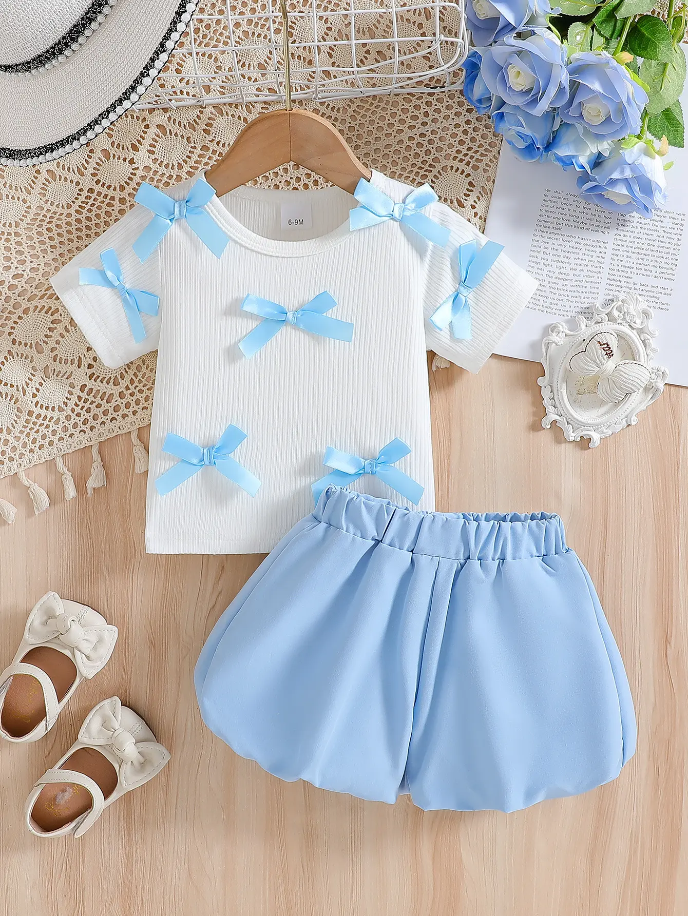 Baby Girl Summer Sweet Cool Trendy Round Neck White Pit Strip Short Sleeve Ribbon Bow Decorative Top and Black Puff Pants Set