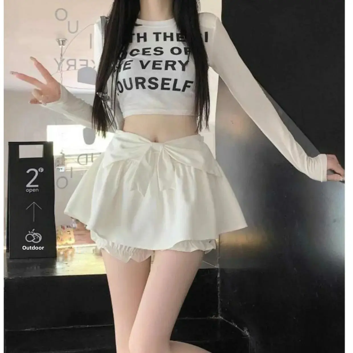 Whitebow High-Waisted A- Line Mini Skirt For Women Summer 2023 Anti-Exposure Short Length Trendy Female Loose Skirt