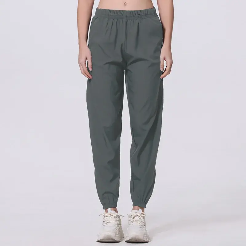 Casual Summer Pure Color Women's Basic Pocket Long Pants Sports Nine Points Cuffed Trousers Versatile Loose Fit Female Model