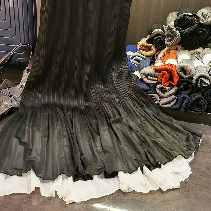 LANMREM French Style High-End Black Pleated Midi Skirt For Women 2025 Chic New Elegant Colorblock Patchwork Hem Skirts 2DB3763