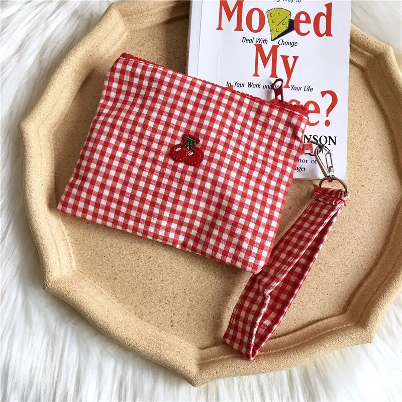 Red cherry canvas makeup bag, portable and easy to carry. Red plaid, large capacity cosmetic lipstick storage bag