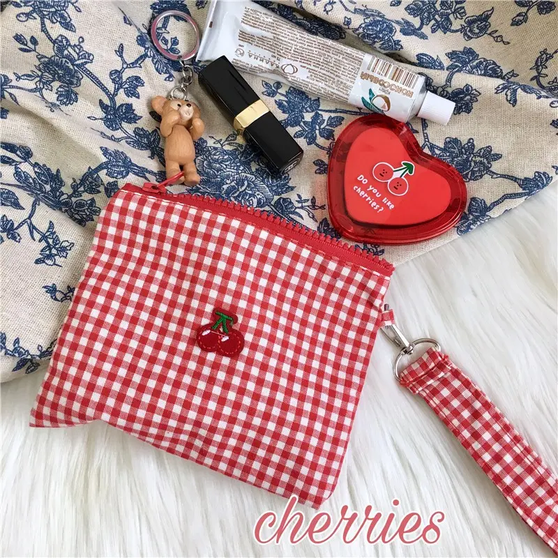 Red cherry canvas makeup bag, portable and easy to carry. Red plaid, large capacity cosmetic lipstick storage bag