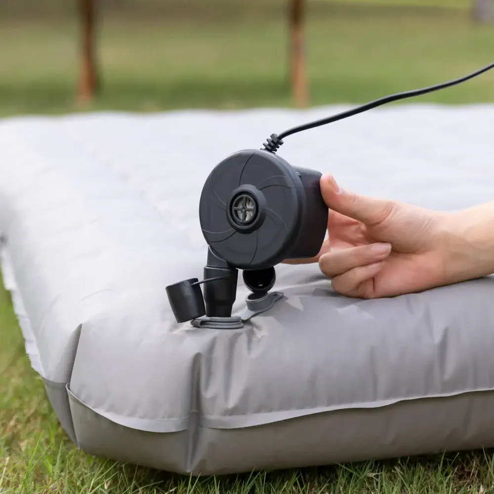 Portable electric air pump with multiple nozzles for quick and easy inflation of air mattresses, pool rafts and inflatable toys