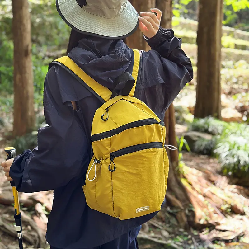 2025 outdoor hiking bag, lightweight hiking bag, men's and women's sports cycling bag, solid color lightweight small backpack