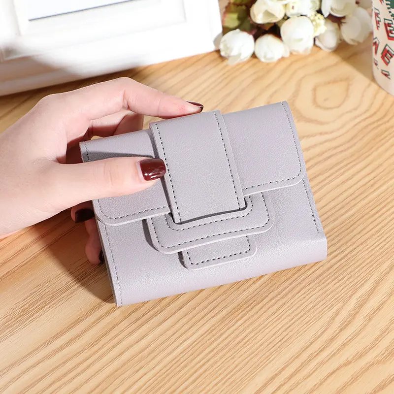 New Korean version of solid color belt ladies purse female coin purse clutch bag student short wallet wallet