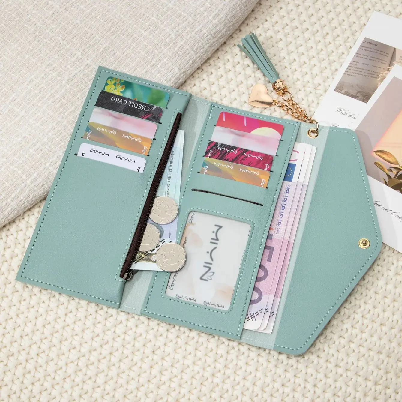 Simple and stylish three fold women's wallet PU leather large capacity long wallet tassel pendant solid color wallet card bag