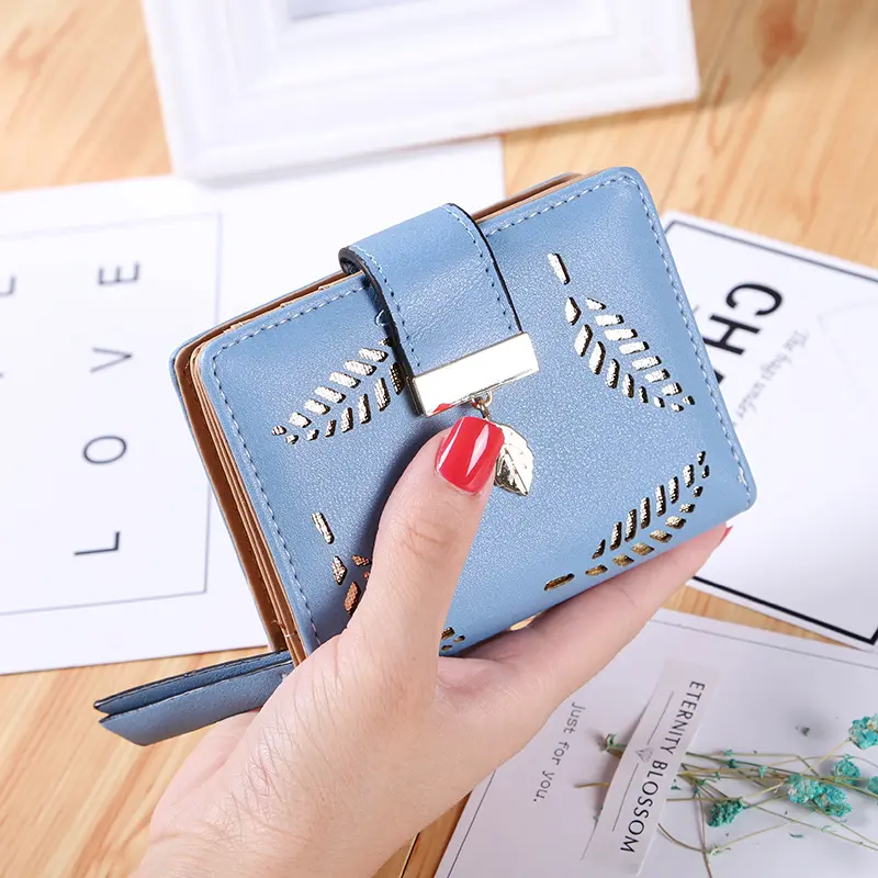 New Korean version of the short wallet lady zipper buckle hollow leaves small wallet wallet card package factory wholesale.