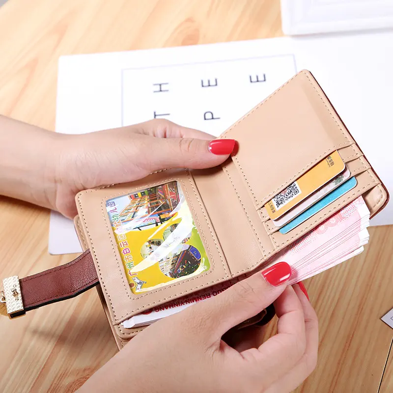 New Korean version of the short wallet lady zipper buckle hollow leaves small wallet wallet card package factory wholesale.