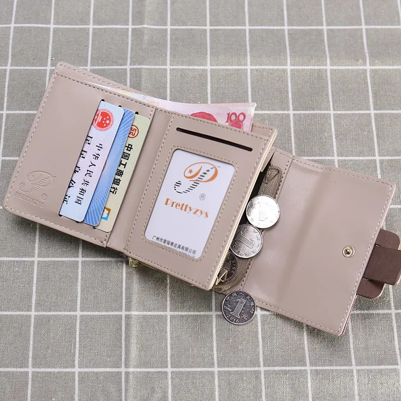 Spring and Summer new women's short purse Korean version printed buckle simple everything folding short women's wallet PU leathe