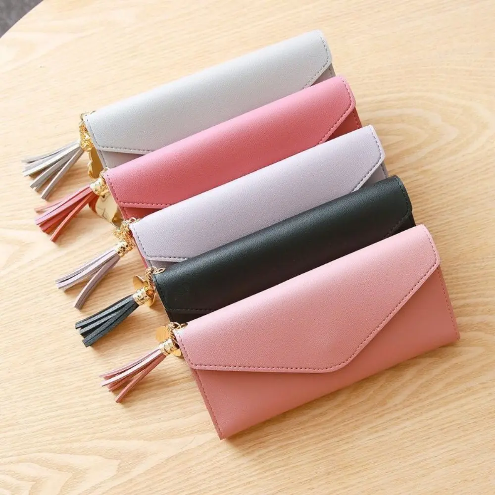 New tassel pendant women's wallet, long fashionable coin purse, Korean version cute student zipper card bag and coin bag