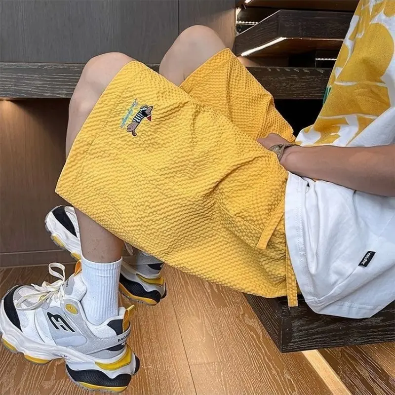 Summer new bubble grid simple casual shorts men's trendy brand breathable sports five quarter pants loose beach pants