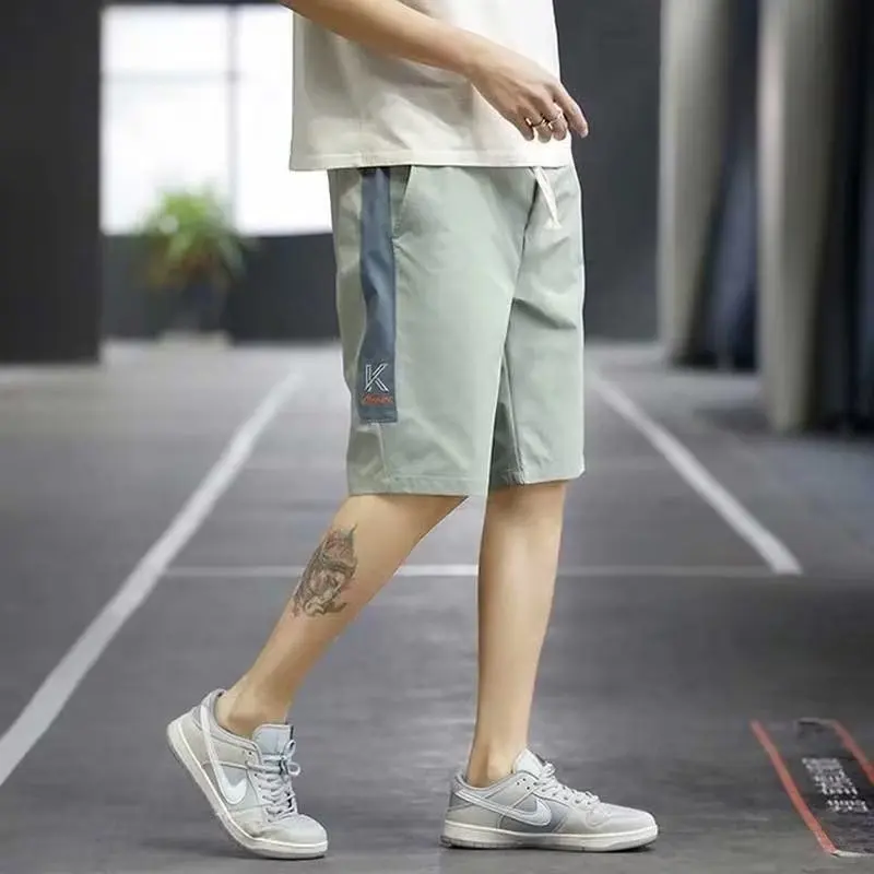Summer basketball shorts men's thin style new quick drying ice silk pants loose casual five quarter pants