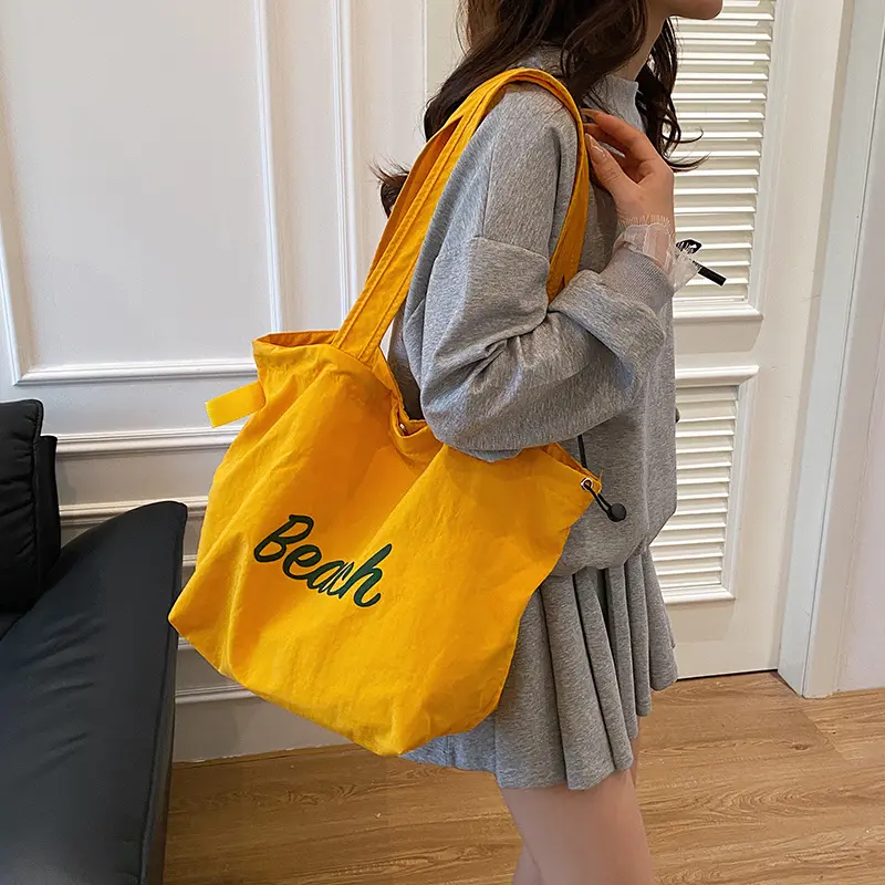 Fashion Letter Shoulder Bags for Women Simple Commuter Student Girls Armpit Tote High Capacity Drawstring Design Female Handbags