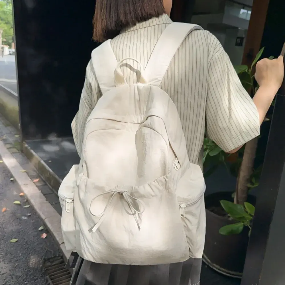 Lightweight Nylon School Bag Women's Japanese Style Student Backpack Solid Color Simple Bow Casual Travel Backpack Boys Girls