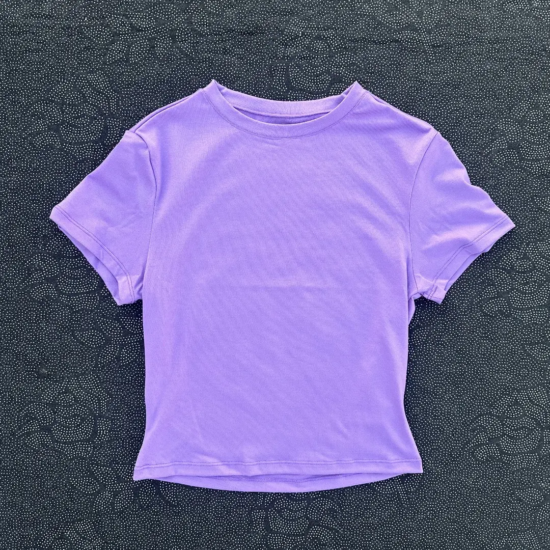 Solid color women's soft breathable yoga short-sleeved comprehensive training tight T-shirt with exposed belly button fitness sh