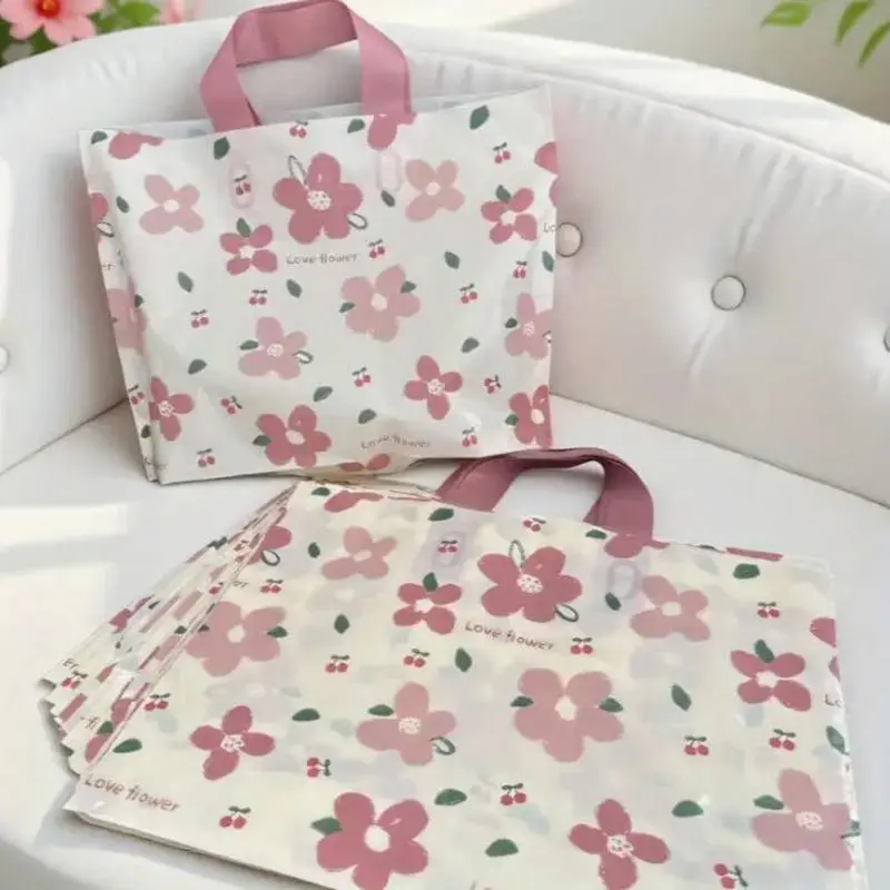50Pcs Flower Printing Plastic Tote Bag Clothing Store Shopping Packaging Bags With Handle Party Gift Wrapping Pouches