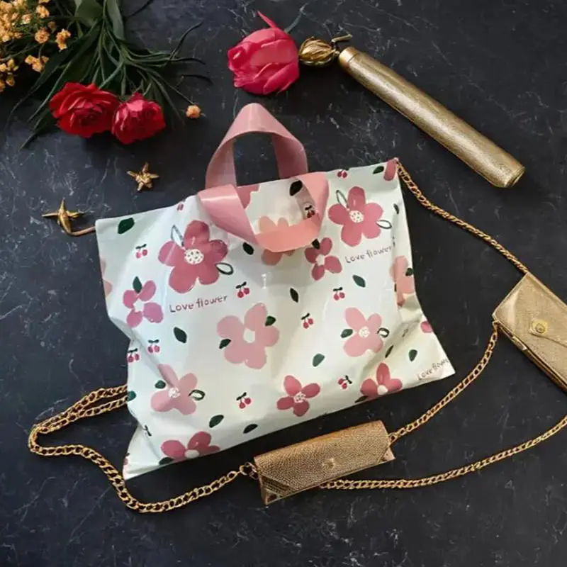 50Pcs Flower Printing Plastic Tote Bag Clothing Store Shopping Packaging Bags With Handle Party Gift Wrapping Pouches