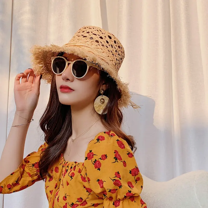2021 New Summer Raffia Straw hat Hollow Out Retro Beach Fisherman Hat Basin Hat Fashion Straw Hat Fashion Tassel Woman Hat cap