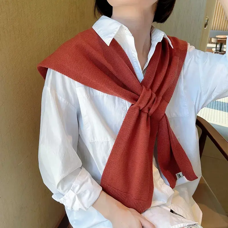 Korean knitted shawl female autumn and winter air-conditioned room knitted cross shawl fashion over a solid color scarf