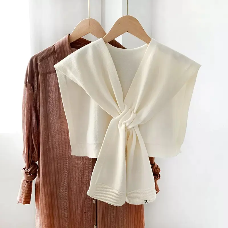 Korean knitted shawl female autumn and winter air-conditioned room knitted cross shawl fashion over a solid color scarf