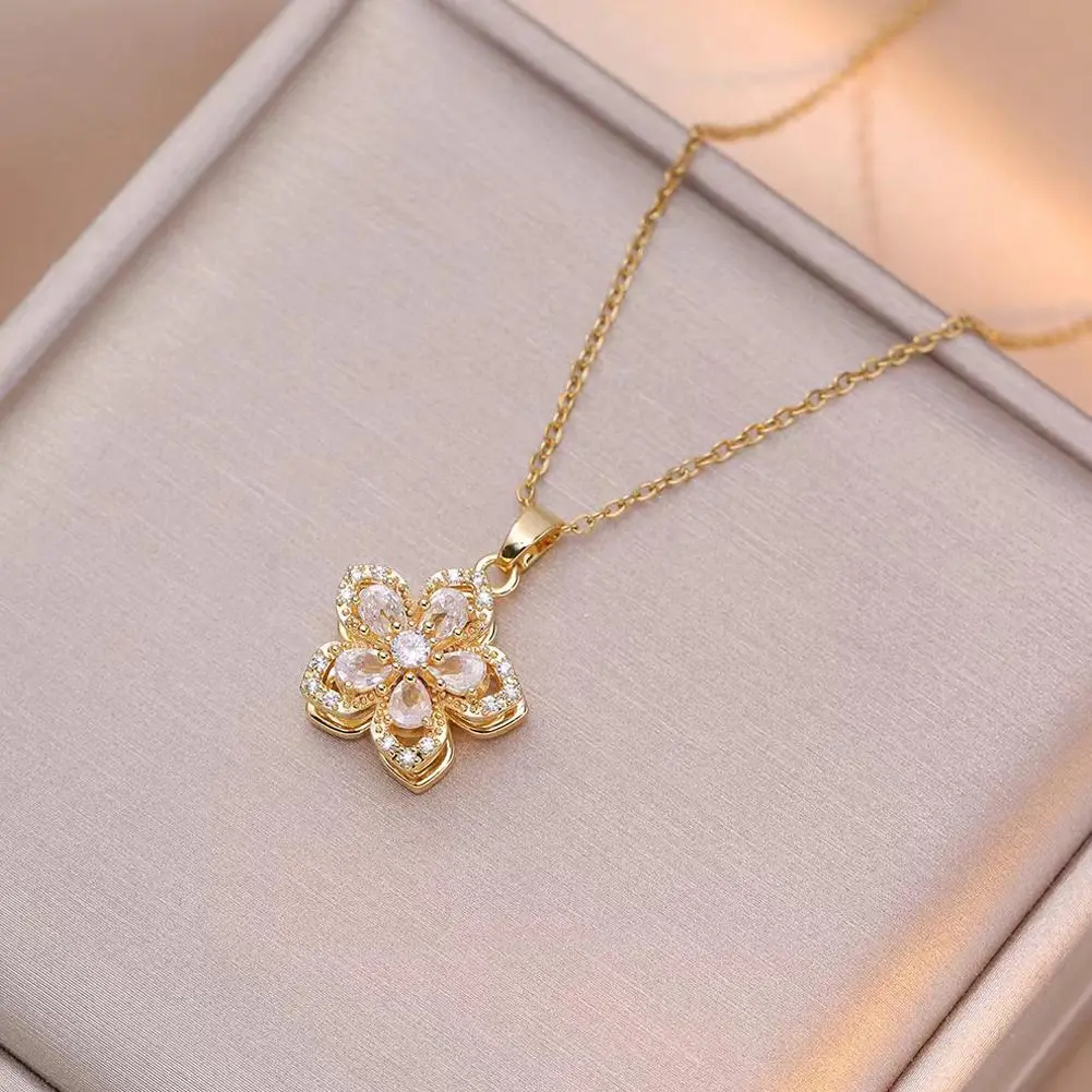 Rotating Bauhinia Zirconia Flowers Niche Light Luxury New Design Pendant Temperament Titanium Steel Necklace