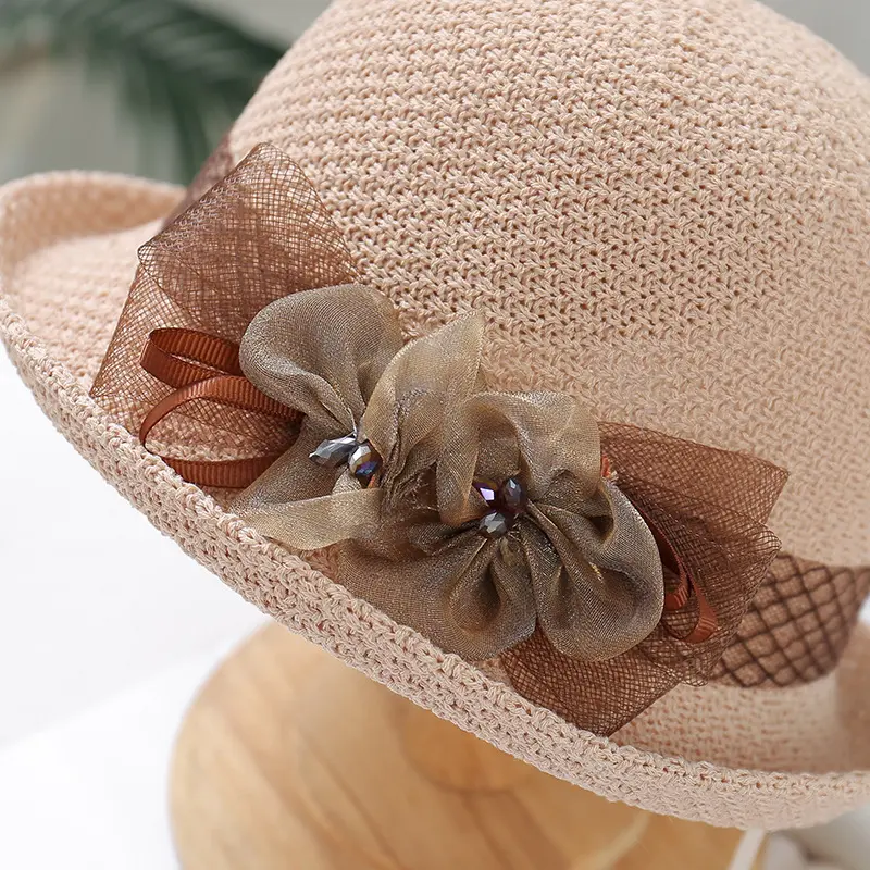 Summer New Flip up Small Round Hat Korean Edition Leisure Beach Sunshade Hat Temperament Grass Hat Ribbon Flower Top Hat