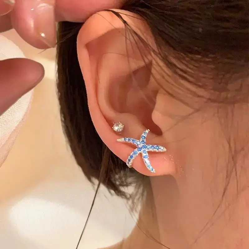 Trend-Setting Blue Diamond Starfish Summer Ear Studs; Adorable Small Accessory for Women, Girls and Beach Parties.