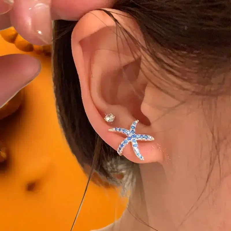 Trend-Setting Blue Diamond Starfish Summer Ear Studs; Adorable Small Accessory for Women, Girls and Beach Parties.