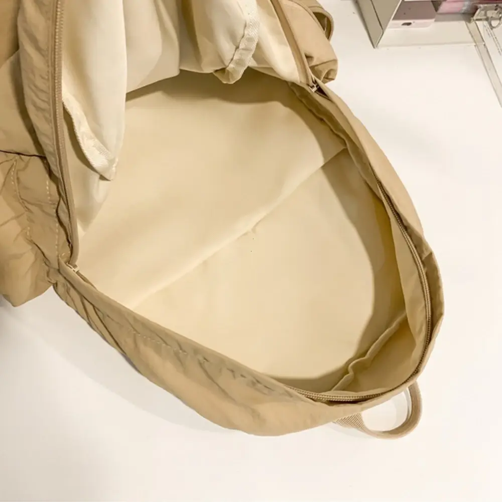 New Student Backpack Women's Japanese Style Lightweight and Fashionable Backpack Solid Color Simple Bow Casual Travel Backpack