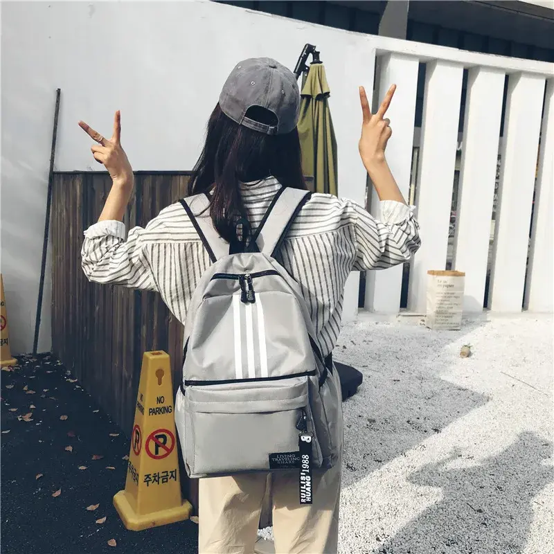 New backpack male large capacity couple backpack University high school student backpack campus travel tide double back