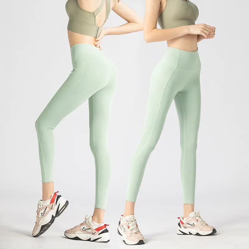 Side pocket yoga pants women's cross-border peach high waist hip lift elastic running backing sports fitness leggings yoga pants