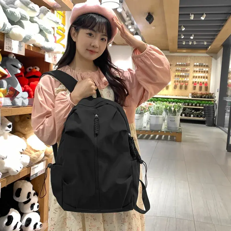 Primary and secondary school students backpack large capacity schoolbag 2024 new backpack Korean version of fashion Harajuku bag