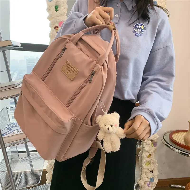 Schoolbag female junior high school students high school students large capacity backpack travel college students simple