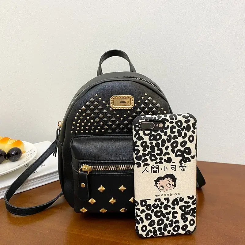 Riveted small schoolbag new women's school bag wholesale leisure backpack backpack