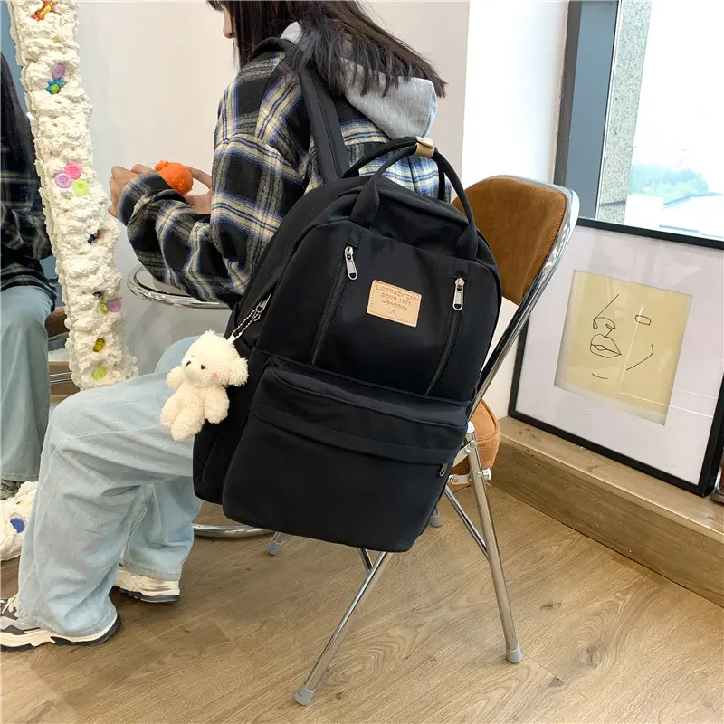 Schoolbag female junior high school students high school students large capacity backpack travel college students simple