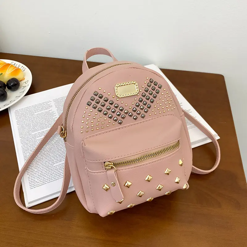Riveted small schoolbag new women's school bag wholesale leisure backpack backpack